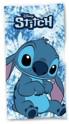 a blue and white towel with the words stitch on it's front, sitting next to a cartoon character