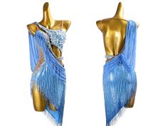 two mannequins wearing blue and gold costumes