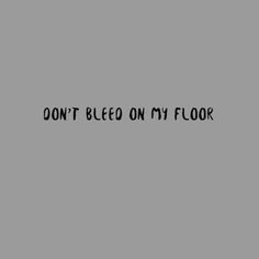 the words don't bleed on my floor are written in black ink against a gray background