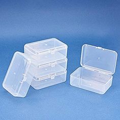 three clear plastic containers on a blue background