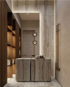 an image of a bathroom setting with marble countertops and cabinets in the middle, along with towel racks on either side