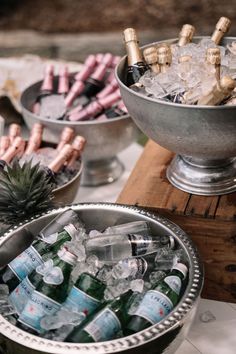 there are many different types of bottles in the bowl on the table and one is empty