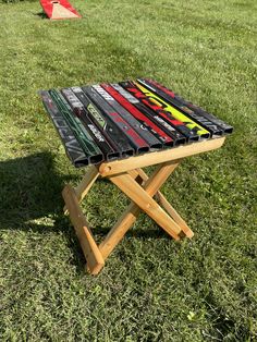 Hockey stick Cedar Adirondack foldable side table. Made from Northern White Cedar and hockey sticks.  Wood dowel joints Deck plus ceramic coated screws  Finished with Ultra Premium Red Label Penofin penetrating oil or unfinished Approximately 16 x 16 x 18 Hockey Stick Coffee Table, Outdoor Air Hockey Table, Adirondack Side Table, Wood Air Hockey Table, Hockey Stick Decor, Northern White Cedar, White Cedar, Great Father, Red Label