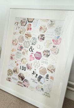 a white frame filled with lots of different types of magnets on it's side