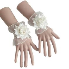 Description: Featuring exquisite workmanship and elegance, this handmade wrist flower is not easily damaged and can be adjusted according to each person's wrist size. Thanks to lace and artificial rose flower decor, this wrist flower coordinates with each other to add more elegance and romance to your wedding. It is constructed of lace material. The diameter is 11cm. The total height of the product is 10cm. It is perfect for bride, bridesmaids, mothers, women, and is suitable for any themed wedding like rustic, boho, french, country etc, or bridal shower, anniversary, ceremony, festivals, prom night, beach party, snapshot, photograph props etc. Item Name: Wrist Flower Material: Lace Features: Fine Workmanship, Handmade, Elegant Looking Size Details: Diameter: 11cm/4.33" (Approx.) Height: 1 Royal Style Wedding, Wedding Wristlet, Wedding Wristlets, Hand Decoration, Mesh Headband, Wedding Headwear, Hand Flower, Wrist Flowers, Bride Floral