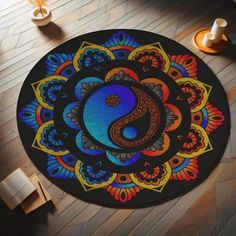 a colorful rug with a yin symbol on it