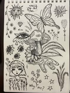 a notebook with drawings on it and some flowers in the background, including a lady's face