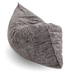 a gray bean bag sitting on top of a white floor