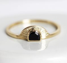 Bohemian engagement ring, a half moon black onyx sunrise ring. A perfect dainty & unique boho inspired ring for a special bride. Select gemstone option from drop down menu. White diamond option comes with 0.16 - 0.17ct half moon diamond ★Details Gemstone: half moon spinel 6x4mm Setting: bezel Band measurements: approx. 1.8mm Material: 14k solid yellow, white or rose solid gold (If you would prefer 18k gold or platinum, please contact us before purchase.) Sizes available: 2-8 (Larger and smal Bohemian Engagement Ring, Sunset Ring, Half Moon Diamond, Bezel Band, Gold Sunset, Black Spinel Ring, White Sapphire Engagement Ring, Moon Black, Spinel Ring