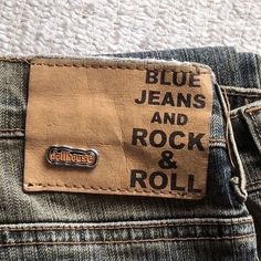 blue jeans and rock & roll label on the back of a pair of jeans