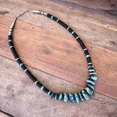 Vintage hand crafted artisan Navajo necklace featuring turquoise tabs, black onyx, and sterling silver bench beads. Crafted date is approximate. Hook and eye closure. 17" Excellent condition! Navajo Turquoise, Onyx Bead, Black Onyx, Onyx, Hand Crafted, Bench, Beaded Necklace, Jewelry Necklaces