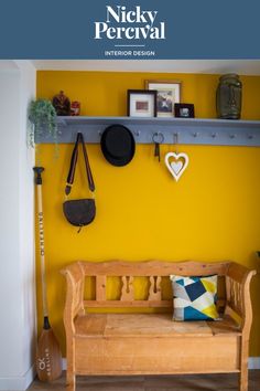 Kitchen bar stools surround an island with pendant lights