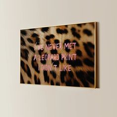 a leopard print with the words we never met a leopard print don't like