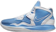 a blue and white basketball shoe on a white background