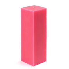 a pink pillar candle on a white background