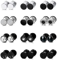 different types of black and silver ear plugs with white dots on the top one