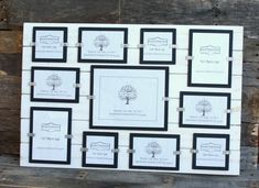 a white and black wall hanging with nine framed pictures on it, each displaying different types of trees