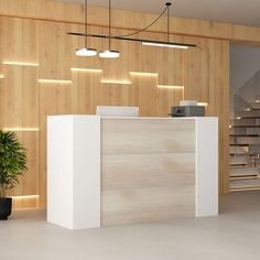 an empty reception area with wooden walls and lighting above the counter, along with potted plants