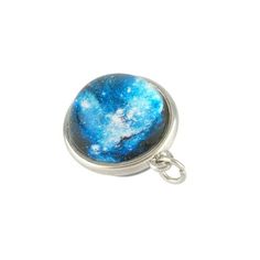 a blue and white space pendant on a silver plated keychain with a chain