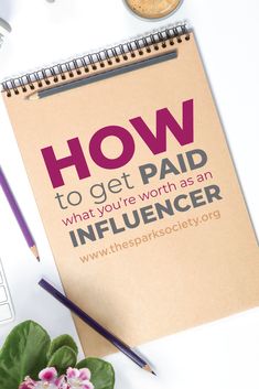 a notebook with the title how to get paid what you're worth as an influencer