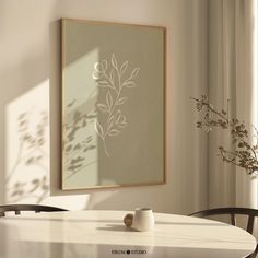 a white table with two vases sitting on top of it next to a window