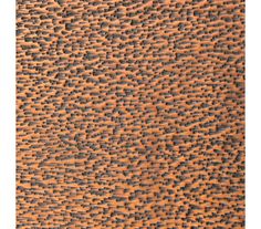 an orange and black textured surface with small dots