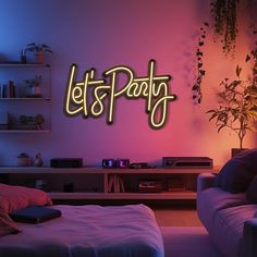 a neon sign that says let's party on the wall next to a couch