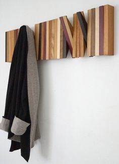 the coat rack is made out of wood strips