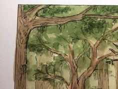 a drawing of a tree with green leaves