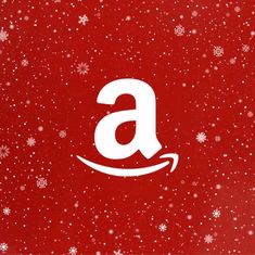 an amazon logo on a red background with snow flakes