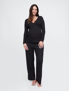 Soft modal-blend ribbed knit maternity pajama set.  Crossover V-neck.  Long sleeves.  Elasticized waist at PJ pants.  Please note: Maternity styles cannot be returned in store.  Please enjoy free returns by mail.  This product was made in a factory that invests in gender equality and women’s empowerment.  Through RISE Reimagining Industry to Support Equality) and Gap Inc. ’s program P. A. C. E.  Personal Advancement & Career Enhancement), we support people who make our clothes to build the skills, knowledge, confidence, and resilience needed to advance in work and life.  Learn more here.  Choose your maternity Maternity Pajama Set, Maternity Styles, Preggo Fashion, Maternity Pajamas, Gap Maternity, Gender Equality, Support People, Pj Pants, Pj Sets