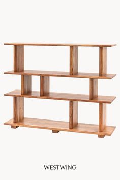 a wooden shelf with three shelves on each side and the words westwing above it