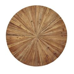 a round wooden table top with an intricate design on the center and bottom, made out of wood planks