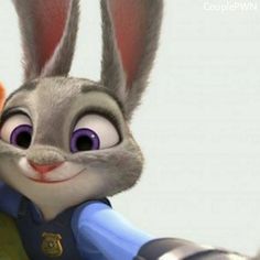 an animated rabbit with big ears and blue overalls is pointing at something in front of him