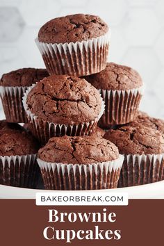 chocolate cupcakes stacked on top of each other with the words brownie cupcakes above them