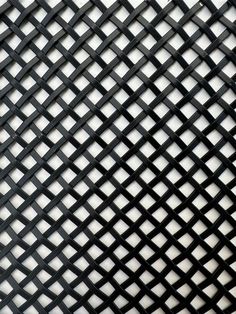 an abstract black and white photo with squares in the center, as if it were woven into fabric