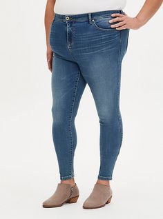 The MidFit Super Skinny jean is made for those with a fuller midsection and slimmer legs. We designed it to give you extra room at the waist but still keep that super skinny fit in the legs.   Eco Wash Denim uses more sustainable techniques like laser finishing and earth-friendly wash processes to help reduce water waste and chemical usage.   Our Super Soft fabric has an extraordinary stretch and a buttery brushed feeling that’s soft enough to sleep in. Mid rise. Extra room at the wais Best Jeans For Short Women Denim, Perfect Jeans For Short Women, Shorting Jeans, Plus Size Jeans, Mid Rise Jeans, High Rise Jeans, Slim Legs, To Sleep, Colored Jeans