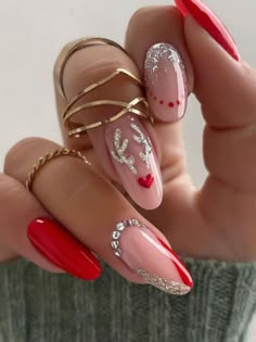 red acrylic nails with a silver Rudolph accent Holiday Nails Christmas, December Nails, Red Christmas Nails, Festive Nail Art, Christmas Nails Acrylic, Festival Nails