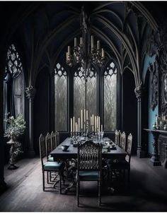 a dining room table and chairs with candles on them in front of large arched windows