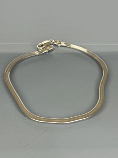 Material=  925 Sterling Silver   Stone/Stones= - Style= Western Length(cm)= 20 cm Weight(gr)=2.7 Coating=None Item Specify=minimalist This elegant 925 sterling silver herringbone bracelet is a must-have addition to any jewelry collection. Its sleek and minimalist design makes it versatile for everyday wear or special occasions, while the high-quality sterling silver adds a touch of sophistication to any outfit. A perfect gift for her on birthdays, anniversaries, or just because. ✨ Material: Made from premium 925 sterling silver, ensuring durability and long-lasting shine. 🔗 Design: Herringbone style flat snake chain that sits comfortably on the wrist, adding a chic and modern touch. 📏 Size: Measures 7.5 inches in length, ideal for most wrist sizes, with a secure lobster clasp closure. 🎁 Sterling Silver Minimalist Snake Chain Bracelet, Elegant Silver Snake Chain Charm Bracelet, Classic Sterling Silver Snake Chain Bracelet, Adjustable Sterling Silver Snake Chain Bracelet, Elegant Silver Snake-shaped Bracelets, Elegant Flats, Perfect Gift For Her, Fashion Flats, Snake Chain