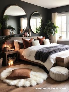 a large bed sitting in a bedroom next to two round mirrors on the side of a wall