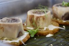 some food is sitting on a metal tray