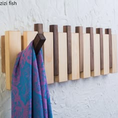 the coat rack is made out of wood