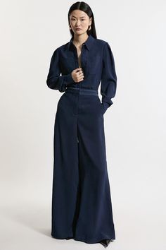 Experience Elevated Tailoring In A Pair Of Wide Leg Trousers, Featuring A Flattering, Relaxed Fit And A Comfortable High Waistline. The Sleek Design Makes Them Easy To Style With Anything, And The Satin Backed Crepe Fabric Creates An Opulent Feel. Style Them With Button Up Shirt For A Formal Look, Or With A T-Shirt And Trainers For A More Laid Back Approach. Satin Back Crepe Woven Wide Leg Trousers High Quality Satin Backed Crepe Fabric Comfortable High Waistline Flattering, Extreme Wide Leg Fit Button Up Shirt Street Style, Monochrome Navy Outfit, Unique Formal Outfits, Formal Pants Outfit, Blue Monochrome Outfit, Masculine Feminine Fashion, Stylish Workwear, Dario Fo, Bride Jumpsuit