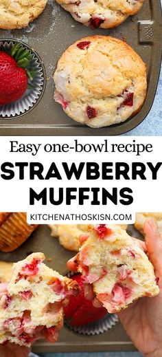 strawberry muffins in a muffin tin with strawberries on the side and one bite taken out