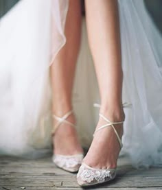 the bride's shoes are tied up and ready to go