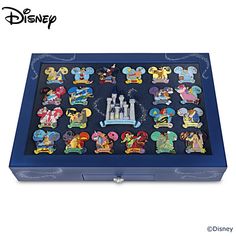 the disney pin collection is displayed in a blue box