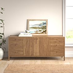 a living room scene with focus on the sideboard