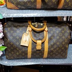 Authentic Louis Vuitton Keepall Size 45 In Good Condition Normal Sign Of Use Dust Bag, Lock Set, Luggage Tag And Poignet Strap If Purchased For Listed Price Canvas Is Good Vibrant No Crack Or Tear Leather Parts Has Some Water Marks And Lite Crack Because Of Dryness. Zipper Smooth Working Good Clean Interior No Foul Smell Date Code Sp0947 In France Year 1997 Guaranteed Free Authentication $500+ By Posh Mark Authenticator Before Shipping To Buyer. Please Be Respectful That Poshmark Gets 20% Of The Selling Price. Luxury Brown Waxed Finish Weekender Bag, Lv Bumbag, Louis Vuitton Dust Bag, Louis Vuitton Deauville, Louis Vuitton Travel Bags, Lv Keepall 50 Travel, Lv Keepall Bandouliere 55, Bag Lock, Louis Vuitton Speedy 35