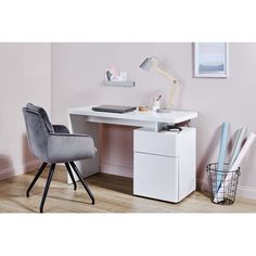 a white desk with a gray chair next to it and a lamp on top of the desk